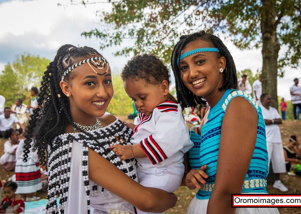 Young Oromo women in beautiful traditional dress with intricate patterns and jewelry